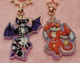 ¡Llaveros acrílicos reflectantes de arcoíris de mis fursonas Inx y Wen!