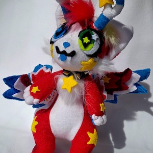 Handmade furry plushie of Inx