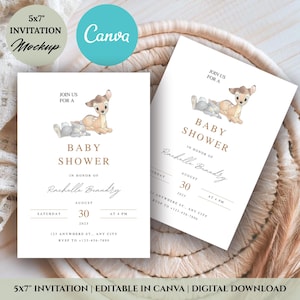 May include: Baby shower invitation mockup featuring a fawn and bunny illustration. The invitation is white with gold text, including the event details and the name "Rachelle Brandry". The invitation is 5x7 inches.