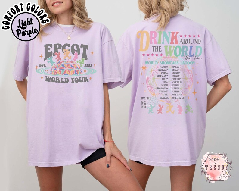 May include: Light purple t-shirt with "EPCOT World Tour" graphic on the front and "Drink Around the World" design on the back. The front graphic features the EPCOT logo and the year 1982. The back design lists countries and phrases.