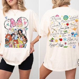 ディズニープリンセスシャツ、水彩画風マジックキャッスルプリンセスTシャツ、ディズニープリンセスシグネチャースケッチスウェットシャツ、ディズニーランドファミリートリップTシャツ