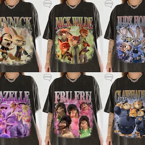 Puede incluir: Seis camisetas de color gris oscuro con personajes de la pel&iacute;cula animada Zootr&oacute;polis. Cada camiseta tiene un personaje o grupo de personajes diferente con sus nombres impresos encima. Las camisetas tienen un aspecto vintage y desgastado.