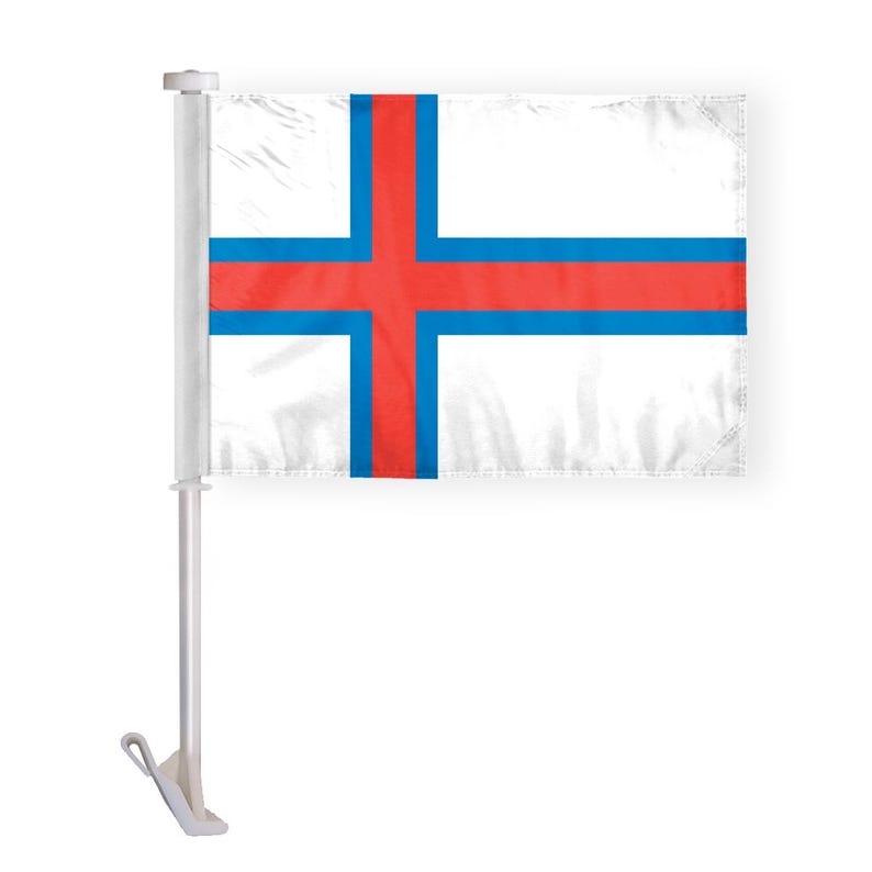 May include: A white car flag with a red and blue cross on it. The flag is attached to a white pole.