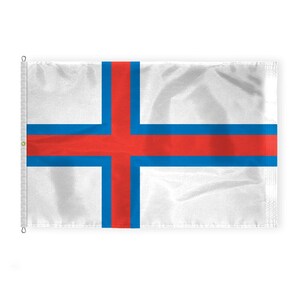 May include: A white flag with a red cross and blue stripes. The flag of the Faroe Islands.