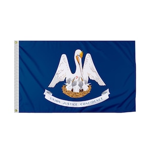 May include: The state flag of Louisiana features a white pelican with its wings spread, feeding its young in a nest. The pelican is on a blue background with a white ribbon that reads "Union, Justice, Confidence".