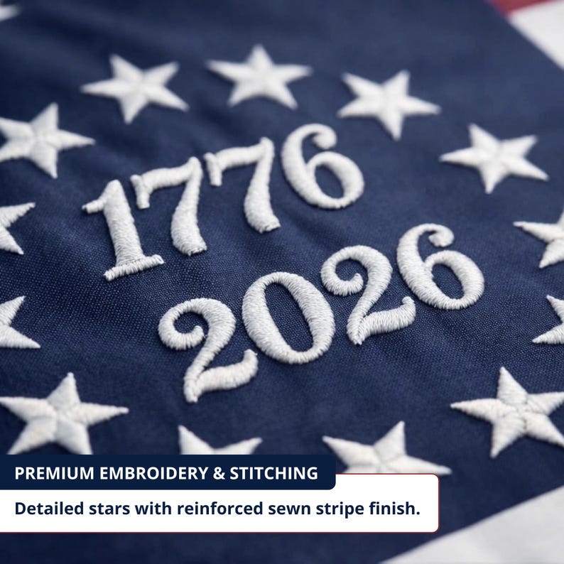 May include: Close-up of navy blue fabric with white embroidered stars and the numbers "1776" and "2026". The text "PREMIUM EMBROIDERY & STITCHING" and "Detailed stars with reinforced sewn stripe finish" are also visible.