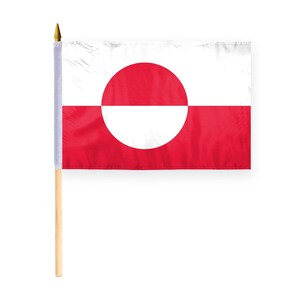 May include: A small, red and white flag with a white circle in the center. The circle is divided in half, with the top half red and the bottom half white. The flag is attached to a wooden pole.
