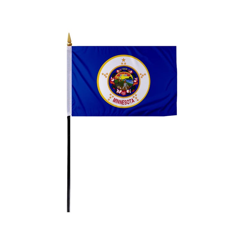 May include: A blue Minnesota state flag with a white circle in the center. The circle contains a gold seal with a depiction of a farmer plowing a field, a gristmill, and a steamboat. The seal is surrounded by 19 gold stars and the word "MINNESOTA" in gold letters.