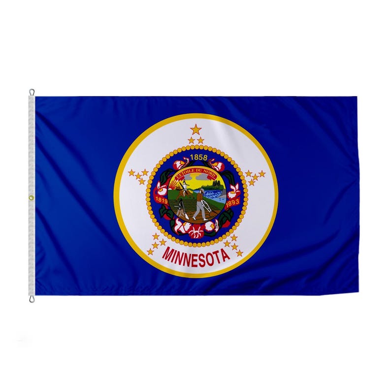 May include: A blue flag with a white circle in the center. The circle contains a gold seal with the words "L'ETOILE DU NORD" and "MINNESOTA" in gold. The seal also includes a depiction of a farmer plowing a field, a gristmill, and a waterfall.