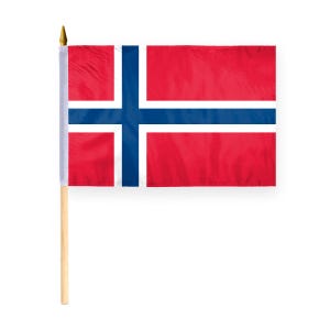 May include: A small, red, white, and blue flag of Norway on a wooden stick. The flag is made of fabric and has a white cross with a blue outline on a red background.