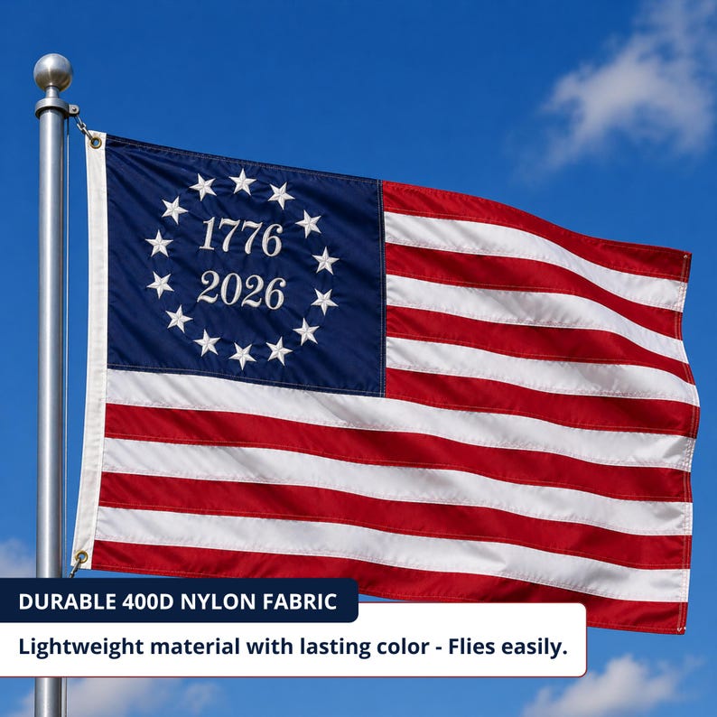 May include: A flag with red and white stripes and a blue canton featuring white stars and the numbers 1776 and 2026. The flag is made of durable 400D nylon fabric. The text reads: Lightweight material with lasting colour - Flies easily.