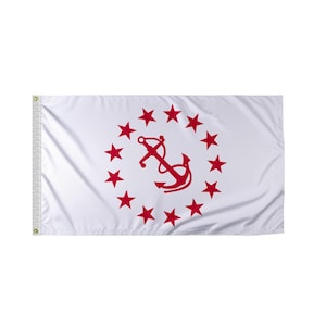 May include: White flag featuring a red anchor surrounded by a circle of thirteen red stars. The flag has a grommeted edge for hanging. The design is centered on the white background.