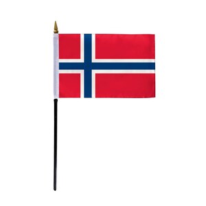 May include: A small desk flag of Norway. The flag is red with a blue cross and white trim. The flag is attached to a black pole with a gold finial.