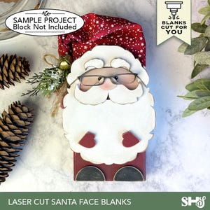 Puede incluir: Una pieza de madera cortada con l&aacute;ser con forma de cara de Pap&aacute; Noel, con barba, bigote y cejas blancas, y gafas. Tiene manoplas rojas y botas negras, coronado con un gorro de tela rojo con estrellas blancas. El texto dice: SAMPLE PROJECT.