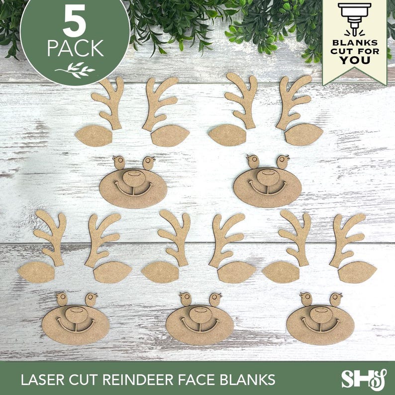 May include: A 5-pack of laser-cut wooden reindeer face blanks, including five oval-shaped faces with etched eyes, noses, and smiles, along with ten individual antler pieces and ten ear pieces, all featuring a natural light brown wood finish.
