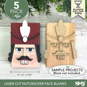 May include: A 5-pack of laser-cut nutcracker face blanks, including one painted nutcracker with a red hat, black hair, and mustache, and one unpainted wooden nutcracker face. The dimensions are 2 inches by 4 inches by 5.25 inches.