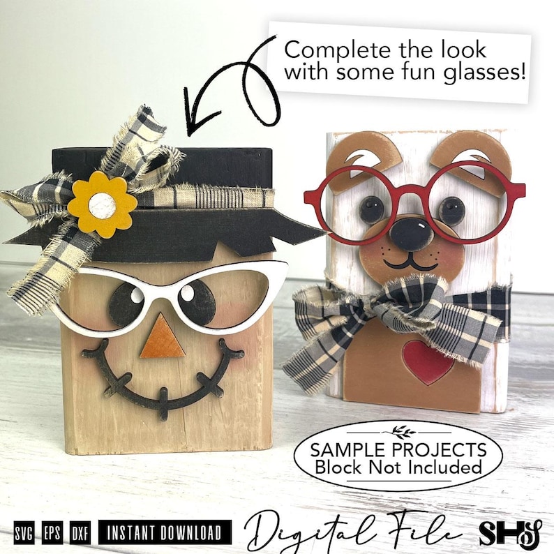 May include: Two wooden block decorations featuring a scarecrow with a black hat, plaid bow, and white glasses, and a bear with red glasses and a plaid bow. Text includes Complete the look with some fun glasses! and SAMPLE PROJECTS Block Not Included.