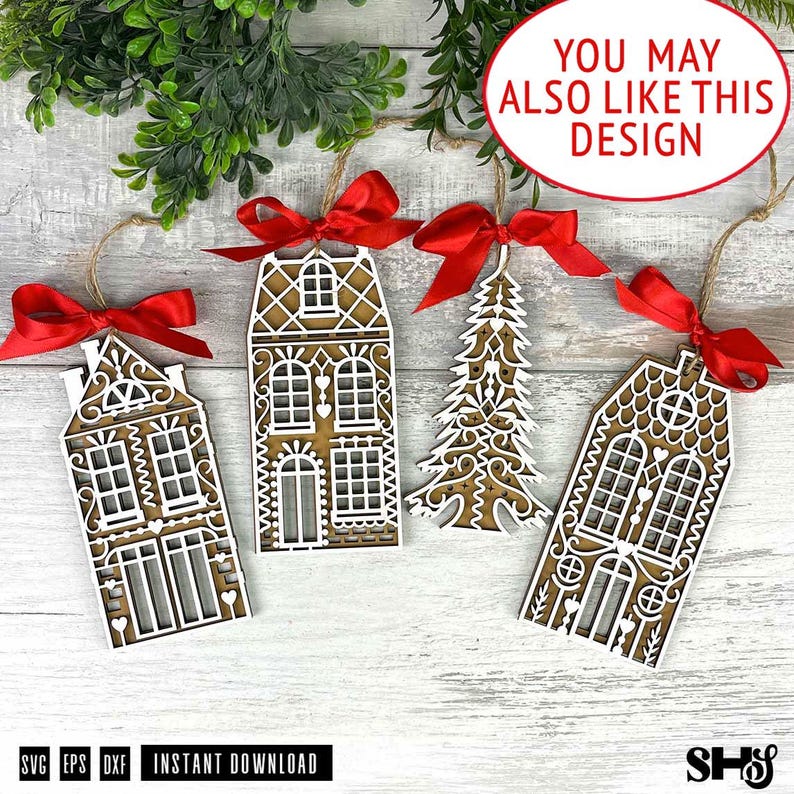 May include: Four laser-cut wooden ornaments featuring two house designs and one Christmas tree design, each layered with white intricate details and topped with a bright red satin ribbon bow for hanging, displayed on a light wood surface.