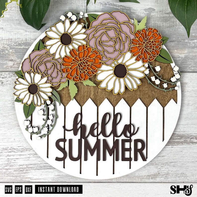 May include: A round wooden sign with a white background and a brown picket fence design. The sign says "hello summer" in black lettering. The top of the sign is decorated with a variety of flowers, including white daisies, pink roses, and orange and brown chrysanthemums.