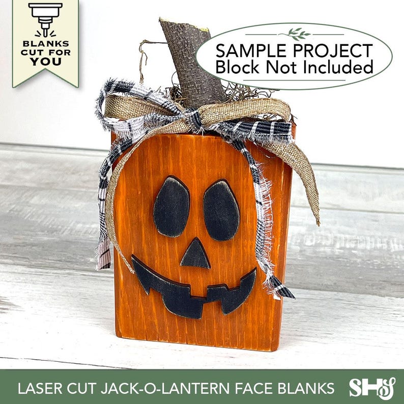 May include: A wooden jack-o'-lantern with a carved face, painted orange with black accents. It has a stem made of a twig and is decorated with a burlap and plaid ribbon. The text "LASER CUT JACK-O-LANTERN FACE BLANKS" is at the bottom.