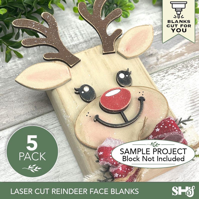May include: A set of laser-cut wooden reindeer face blanks featuring brown antlers, light tan ears, black eyes, and a red nose. The pieces are designed for assembly, with a red and white patterned fabric bow included as an accent for the reindeer.