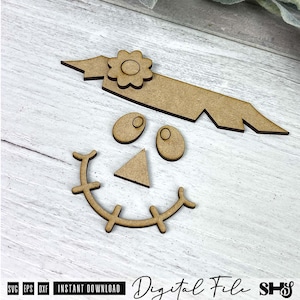 May include: A set of unfinished light brown wooden craft cutouts featuring a horizontal banner with a flower, two oval eyes with inner circles, a triangular nose, and a curved mouth with vertical stitches, all designed for assembly.