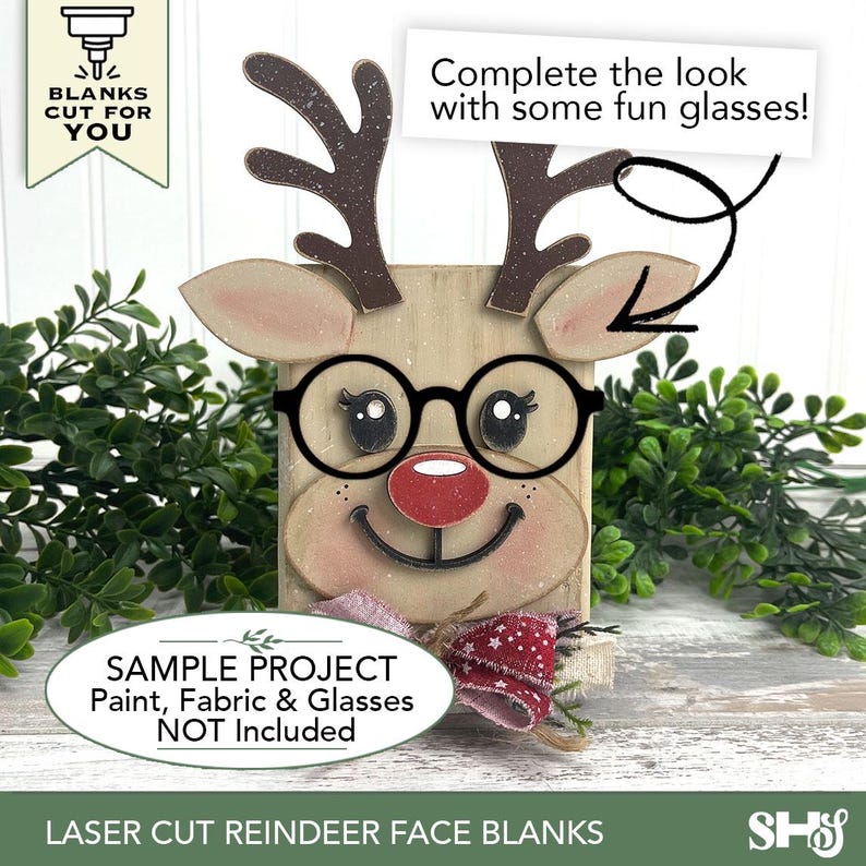 May include: A laser-cut wooden reindeer face blank featuring dark brown antlers, a red nose, and black circular glasses. The piece includes text that reads: BLANKS CUT FOR YOU, Complete the look with some fun glasses!, and SAMPLE PROJECT Paint, Fabric & Glasses NOT Included.