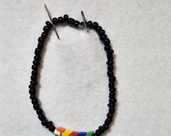 One Direction bracelet with arrows in the singers&#39; colors, hand-painted