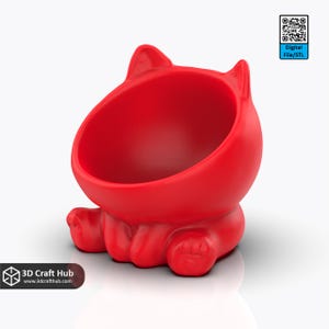 Könnte beinhalten: Eine leuchtend rote, katzenförmige Schüssel mit einer weiten Öffnung und kleinen Ohren. Die Schüssel steht auf vier kleinen Pfoten. Der Text "Digital File/STL" befindet sich in einem blauen Feld oben rechts. Das Logo "3D Craft Hub" befindet sich unten links.