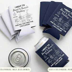 May include: White and navy blue can coolers with the text "I went to David & Emma's Wedding" and illustrations. The white coolers have a blue jean design, and the navy coolers have an ivory design. A can is placed on top of one of the navy coolers.