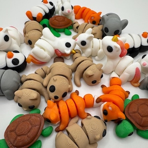 Adorable miniature 3d printed animal set – bunnies, penguins, cats & elephants. sold individually for toys, decorations, gifts and more.