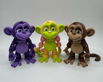 Singe articulé imprimé en 3D avec support en forme d'arbre et accessoire banane en option