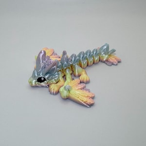 Dragón conejo articulado: criatura fantástica impresa en 3D por Cinderwing3D