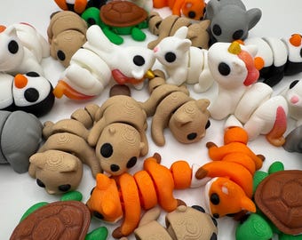 Adorable miniature 3d printed animal set – bunnies, penguins, cats & elephants. sold individually for toys, decorations, gifts and more.