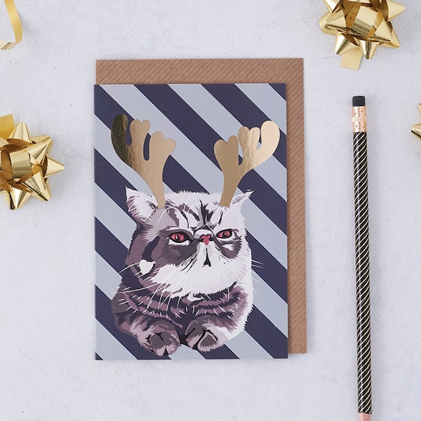 Christmas Persian cat wearing reindeer antlers, cat Christmas card