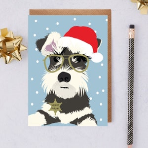 Monty la mini cartolina di Natale schnauzer che indossa il cappello di Babbo Natale