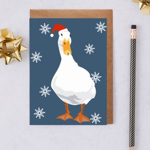 Carte de canard de Noël, portant un chapeau de Père Noël.
