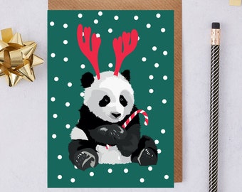 Carte de panda de Noël portant des bois de renne rouges
