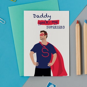 Papai, você é meu herói, cara vestindo uma capa vermelha