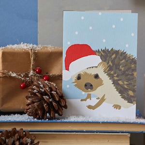 Cartão de ouriço de Natal, com chapéu de Papai Noel