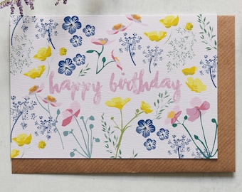 Happy birthday with a floral background