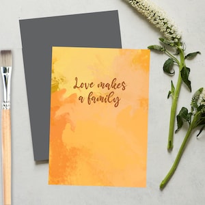 el amor hace una familia, la adopción, la tarjeta de felicitación de crianza pincelada pintada de fondo. mensajes positivos
