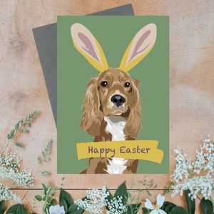 Happy easter greeting card with bunny rabbit ears on golden spaniel dog