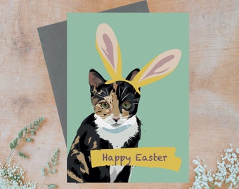 Happy easter greeting card with bunny rabbit ears on tabby cat