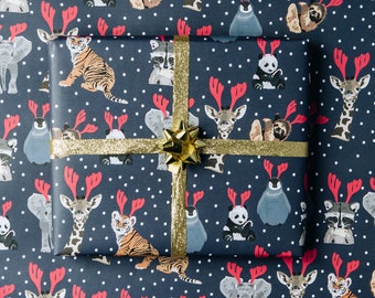 Go wild Christmas wrapping paper, elephant, giraffe, penguin, sloth and tiger