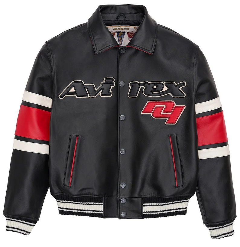 May include: Black leather jacket with the word "Aviirex" in white and red lettering across the chest. The jacket has red and white stripes on the sleeves and a ribbed collar and cuffs. The number "24" is also featured on the jacket.