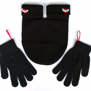 Smitten Mittens, los guantes para compartir que se toman de la mano. Guantes negros y tarjeta incluidos. ¡Regalo romántico perfecto para parejas activas al aire libre!