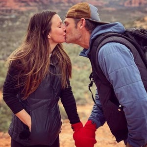Red Smitten mitten, a shareable couples mitten. Winter accessory for couples to hold hands with.