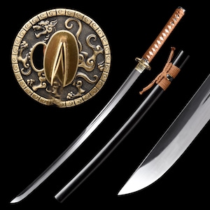 May include: A Japanese katana sword with a curved, polished steel blade. The handle is wrapped in tan fabric, and the scabbard is black. A decorative, circular guard with a dragon design is visible.