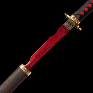 May include: A red and gold decorative sword with a black handle and a red blade. The blade has a unique wave-like design. The handle is wrapped in black material with red diamond-shaped accents. Gold accents are present on the sword.